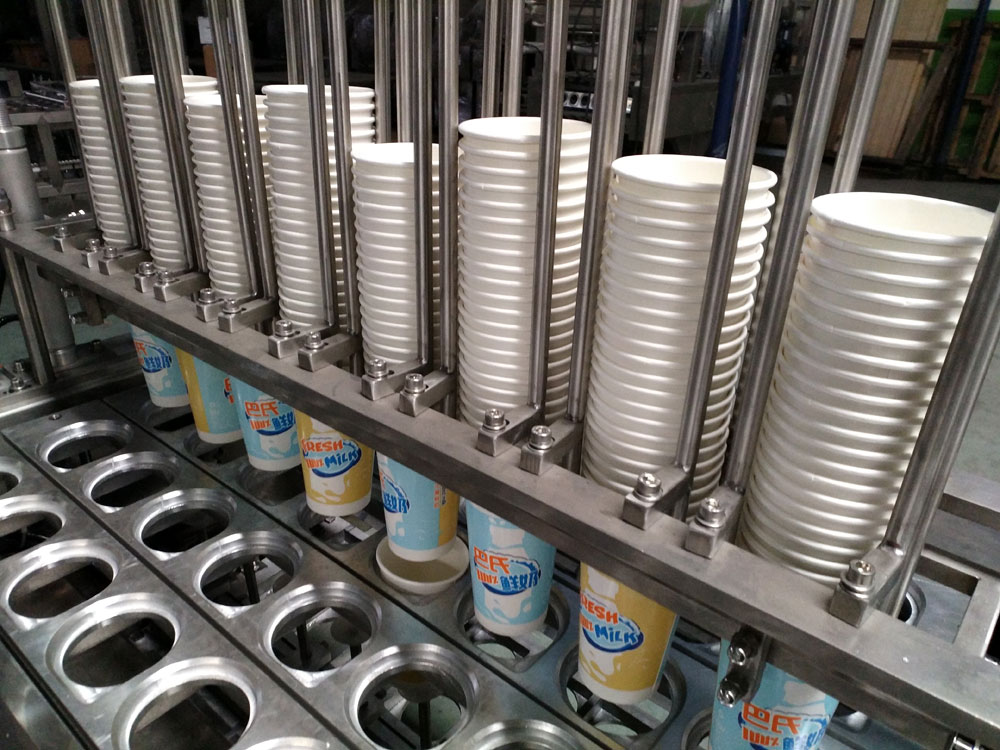 mesin pengisian dan pengedap cawan